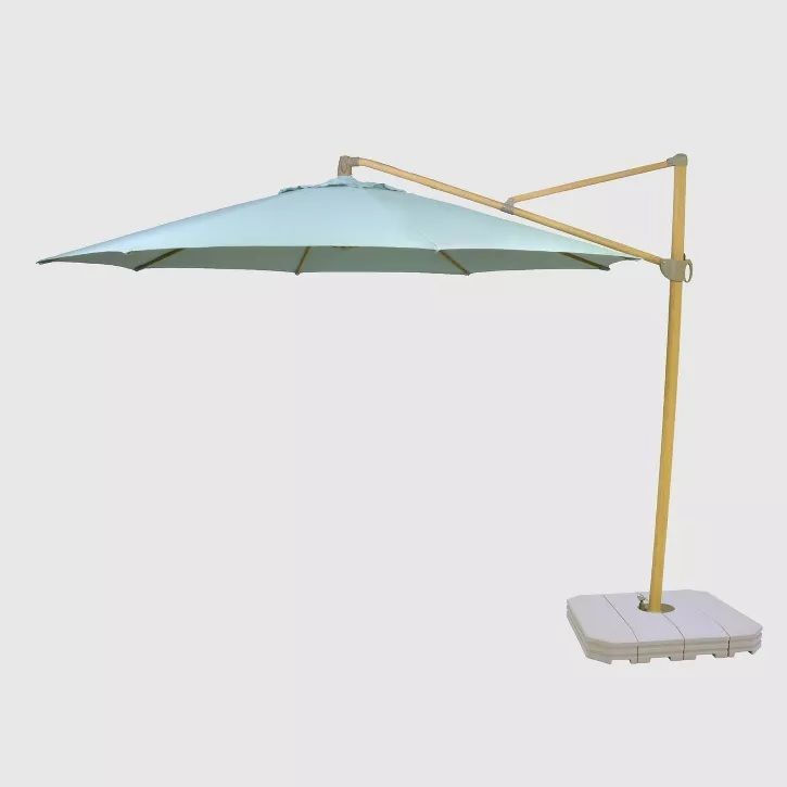 Photo 1 of 11' OFFSET PATIO UMBRELLA DURASEASON FABRIC TAN - LIGHT WOOD POLE - THRESHOLD