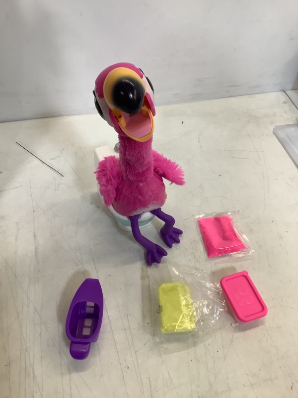 Photo 2 of Little Live Pets Gotta Go Flamingo Value Pack: Sherbet | Interactive Plush Toy That Eats, Sings, Dances, Poops and Talks. Bonus Food, Containers and Bib. Batteries Included. for Kids Ages 4+.