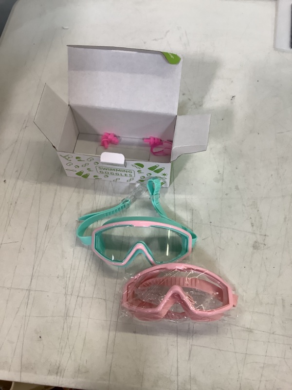 Photo 2 of Freela Goggles for Kids Toddler 3-15, Anti Fog No Leak Clear Swim Goggles for Boys Girls Pool Beach Swimming Light Green & Pink