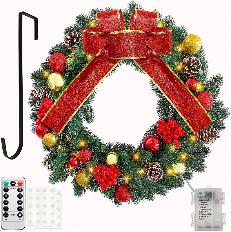 Photo 1 of OurWarm Christmas Wreaths for Front Door, Pre-lit Outdoor Christmas Wreath with 40 LED Lights & Color Balls & Red Bow, Battery Operated Lighted Christmas Wreath for Winter Holiday Door Decorations