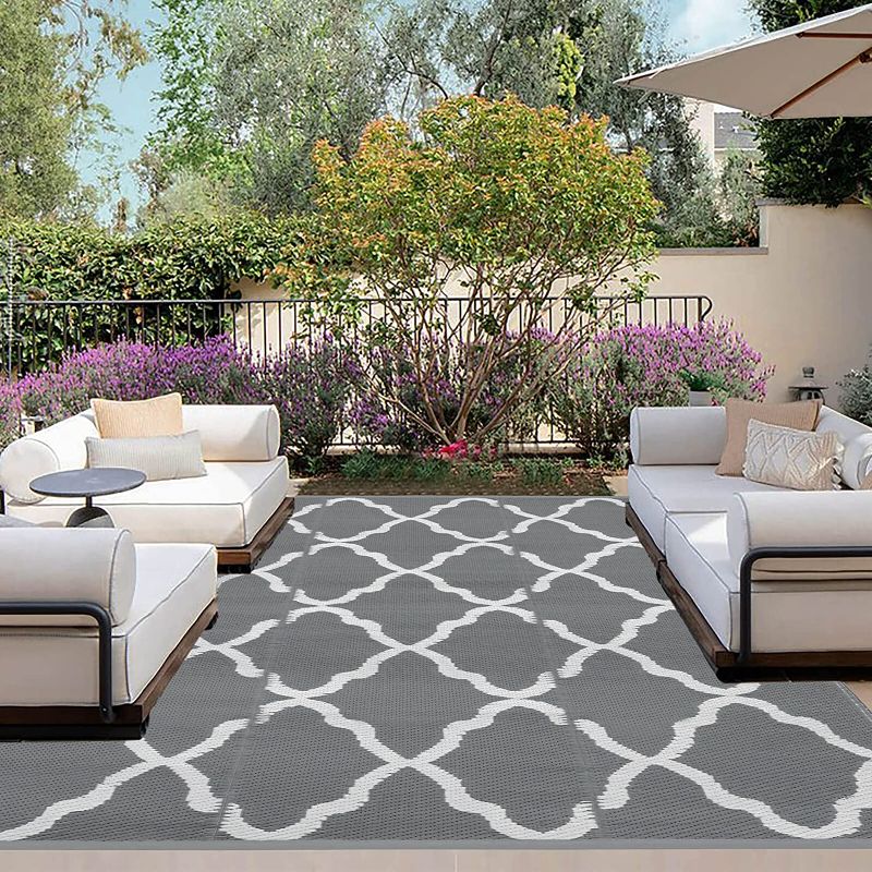 Photo 1 of OutdoorLines Outdoor Area Rugs for Patio 8x10 ft - Reversible Outside Carpet, Stain & UV Resistant RV Mats, Plastic Straw Rug for Camping, Deck Garden, Porch and Balcony, Moroccan Grey & Light Grey