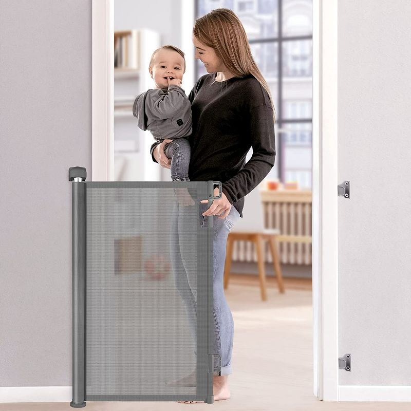 Photo 1 of Retractable Baby Gate, Baby Gate for Stairs, Retractable Dog Gate, Baby Gate with Door 33" Tall, Extends to 55" Wide, Mesh Safety Pet Gate for Staircases, Indoors, Outdoors and Hallways, Grey