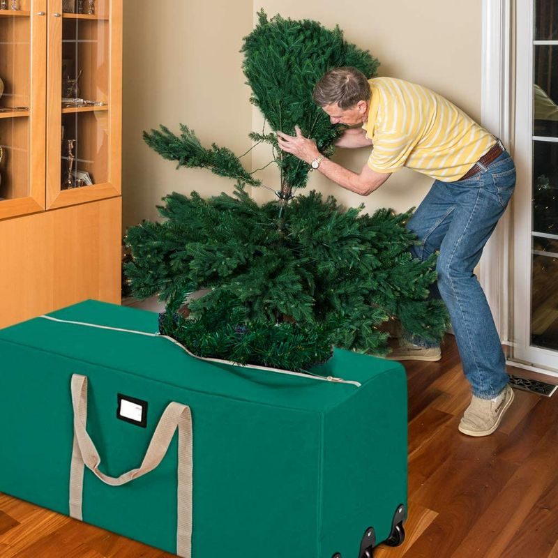 Photo 1 of ProPik Christmas Rolling Tree Storage Bag, Fits Up to 9 ft. Tall Disassembled Holiday Tree, 25" X 20" X 60", Extra Large Heavy Duty Storage Container with Wheels, Front and Side Handles (Green)