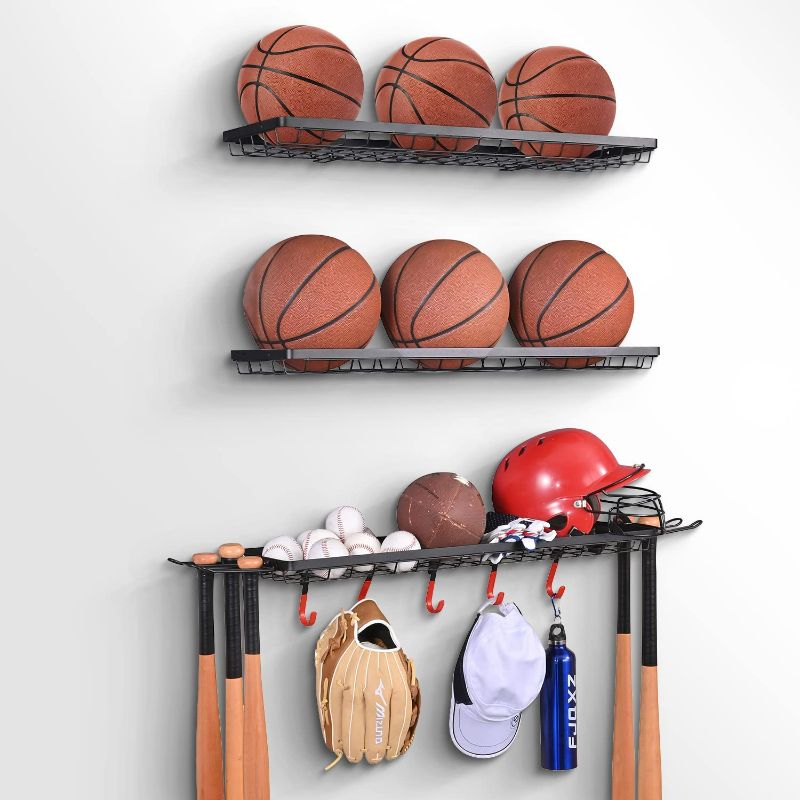 Photo 1 of Mythinglogic Sports Equipment Storage Rack,Wall Mount Ball Storage Racks for Garage, 3 Separate Ball Storage Organizer for Basketball, with Hooks