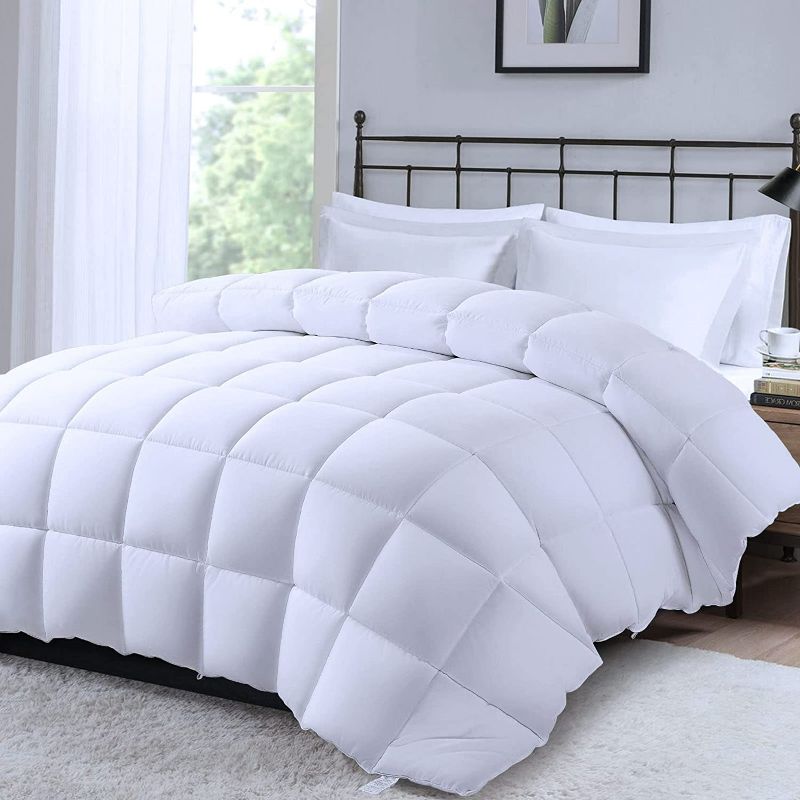 Photo 1 of MERITLIFE Comforter King Size All Season Fluffy Down Alternative Comforter with Corner Tabs, Ultra Soft Double Brushed Microfiber Duvet Insert Machine Washable (White 90"x102")