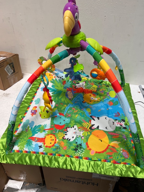 Photo 2 of Fisher-Price Playmat Rainforest Music & Lights Deluxe Gym with 10+ Toys & Activites for Newborn Tummy Time Play [Amazon Exclusive]
