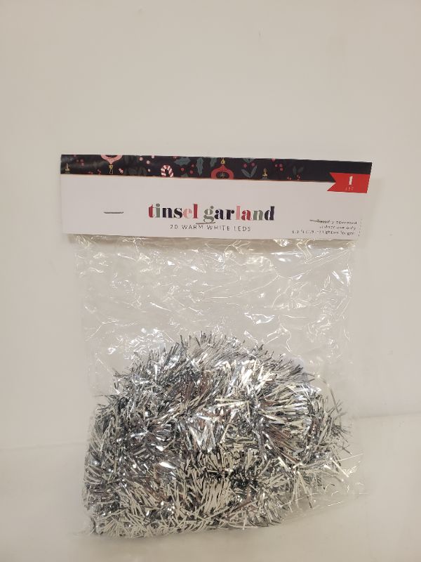 Photo 1 of PACK OF 2 - TINSEL GARLAND - 20 WARM WHITE LEDS - 6.3 FT LIGHTED LENGTH - BATTERY OPERATED 