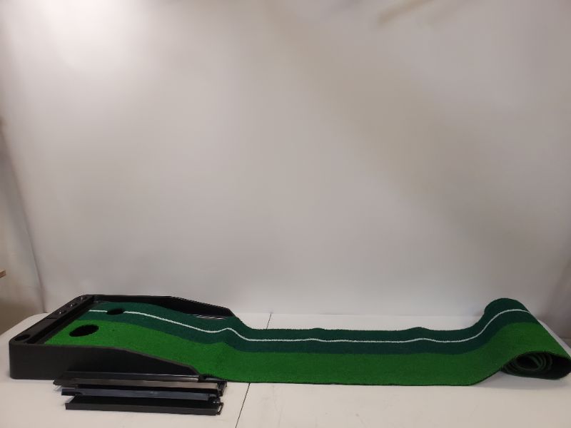 Photo 1 of Inesis Putting Mat with Ball Return -  approximately 95" long 