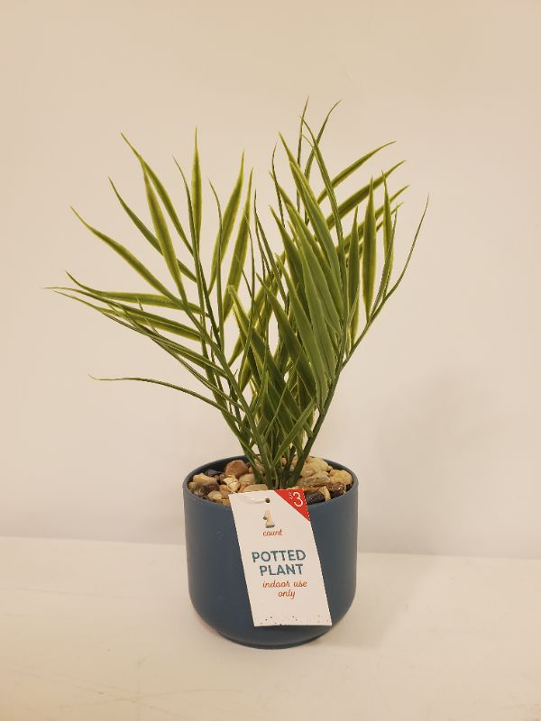 Photo 1 of SMALL 8" POTTED ARTIFICIAL PLANT IN BLUE POT 