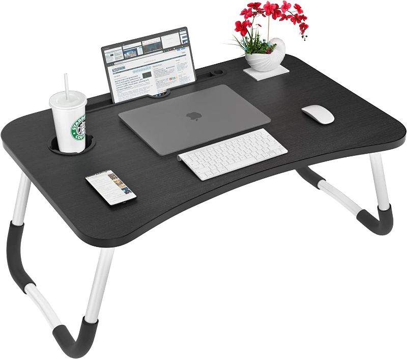 Photo 1 of Laptop Desk, Astoryou Portable Laptop Bed Tray Table Bed Desk with Foldable Legs & Cup Slot for Eating, Working, Reading, Watching Movie on Bed Couch Sofa (Black) 