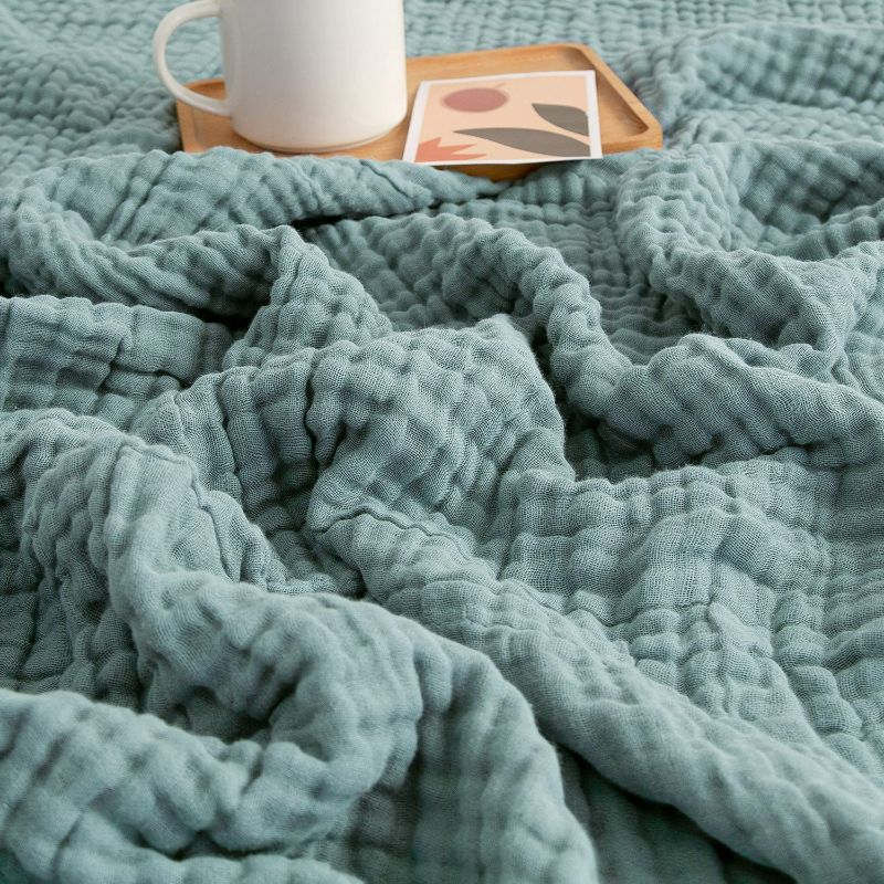 Photo 1 of EMME Muslin Throw Blanket 100% Cotton Throw Blankets for Couch 4-Layer Breathable Gauze Blanket All Season Soft and Lightweight Pre-Washed Cotton Blanket (Teal, 55"x75")
