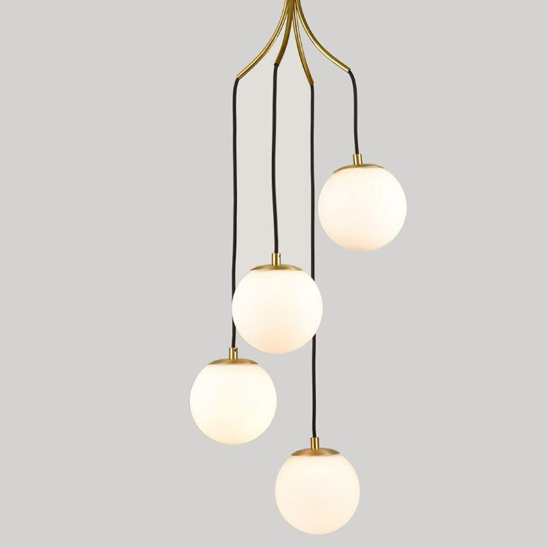 Photo 1 of HOLKIRT Mid Century Modern Pendant Lighting 4-Light Globe Chandeliers White Opal Glass Shade Brass