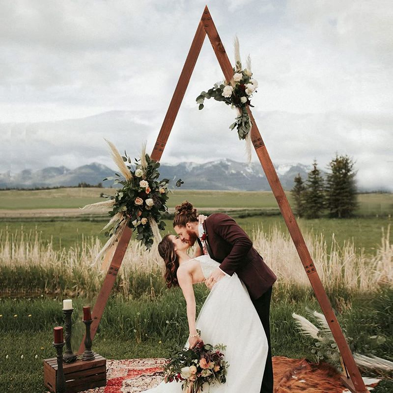 Photo 4 of Tabeskly Large Wedding Ceremony Wooden Arch Geometric Triangle Garden Parties Arbor Backdrop Stand Indoor Outdoor Rustic Farmhouse Theme Event Birthday Reception Party Photo Booth  7.2FT Brown
