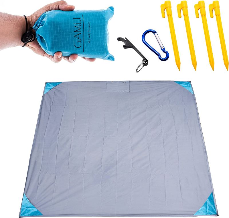 Photo 2 of GAMLI Pocket Blanket for Beach Festival - Camping Hiking Compact Size 55'x60' Fit 4 People - Sand and Waterproof Puncture Resistance with Corner Pocket, Loops, 4 Stakes, Secure Pocket with Zipper