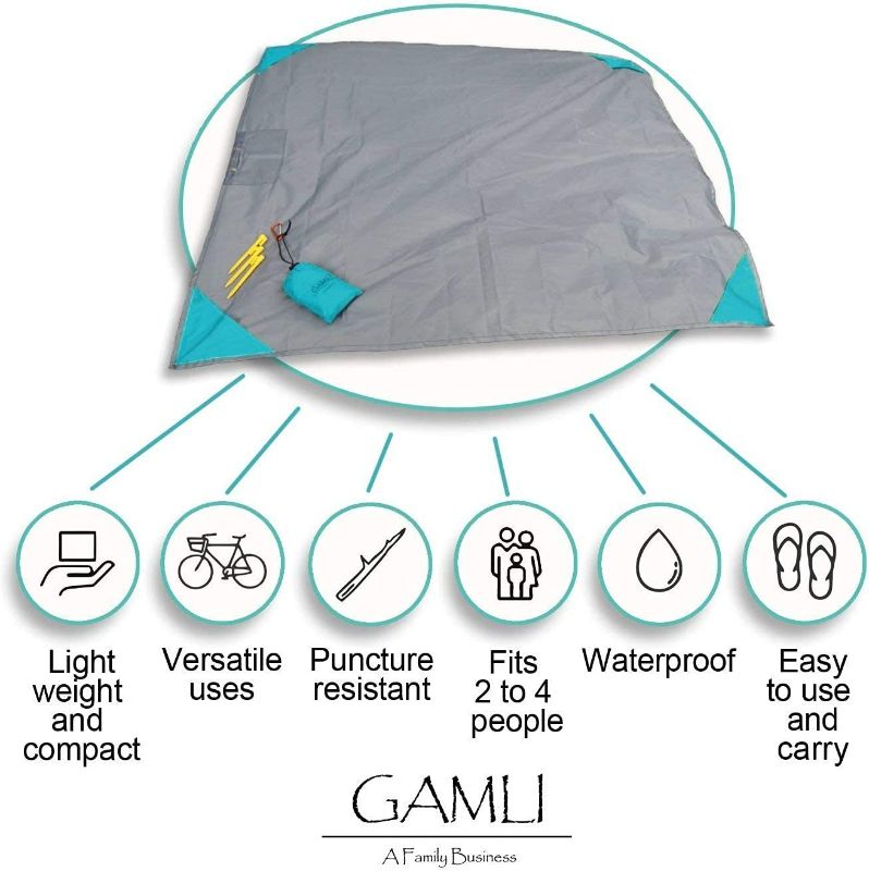 Photo 3 of GAMLI Pocket Blanket for Beach Festival - Camping Hiking Compact Size 55'x60' Fit 4 People - Sand and Waterproof Puncture Resistance with Corner Pocket, Loops, 4 Stakes, Secure Pocket with Zipper