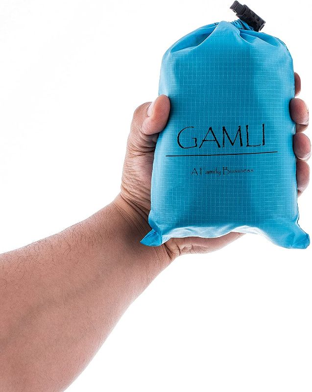 Photo 4 of GAMLI Pocket Blanket for Beach Festival - Camping Hiking Compact Size 55'x60' Fit 4 People - Sand and Waterproof Puncture Resistance with Corner Pocket, Loops, 4 Stakes, Secure Pocket with Zipper