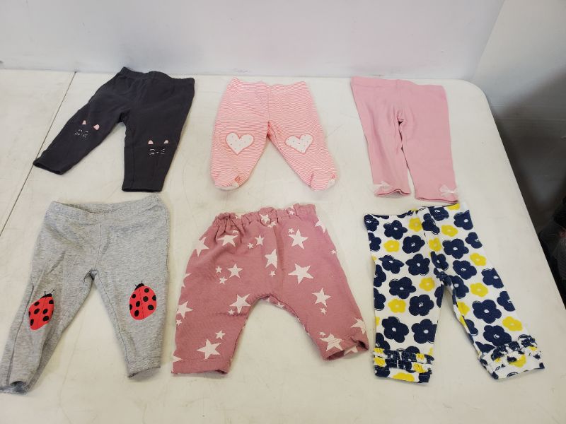 Photo 1 of 6 PIECE BABY GIRL BOTTOMS-  CLOTHING SIZE VARIES (0M-9M)