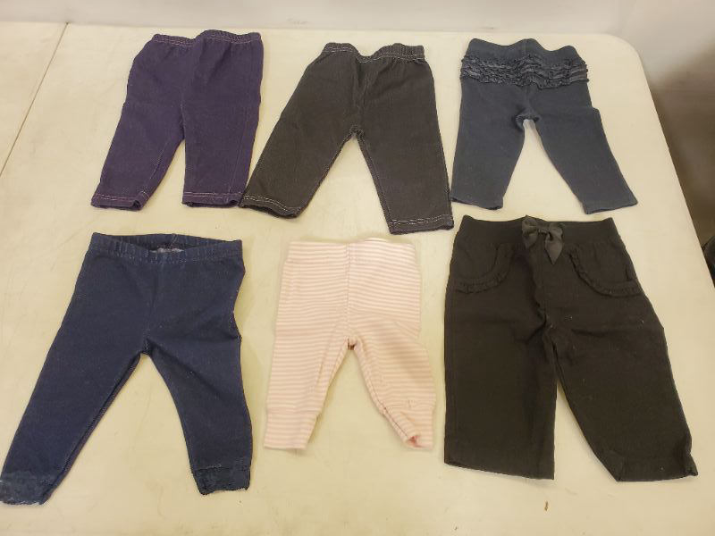 Photo 1 of 6 PIECE BABY GIRL  BOTTOMS-  CLOTHING SIZE VARIES (0M-9M)