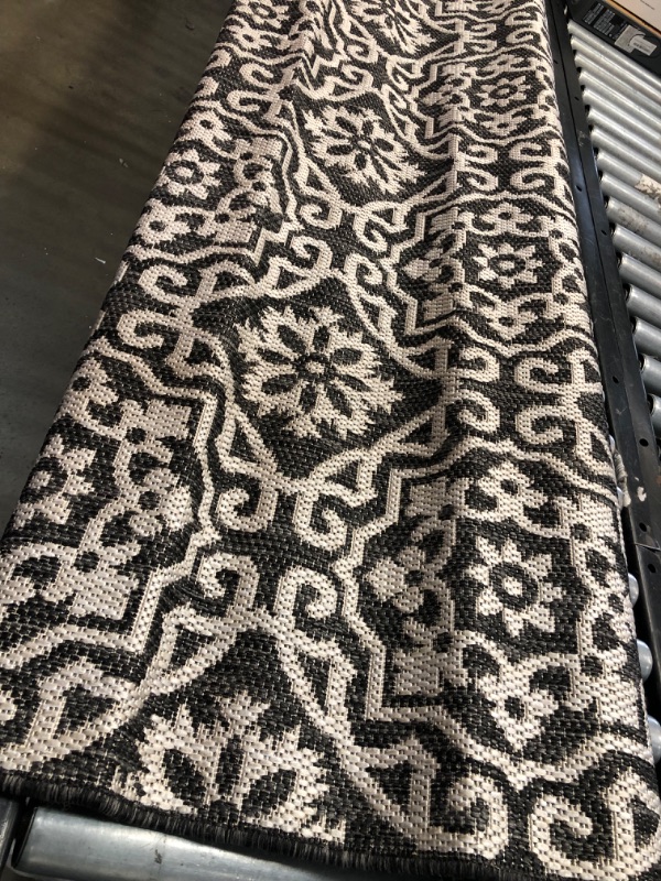 Photo 3 of **used, needs cleaning**
Nicole Miller New York Patio Country Danica Transitional Geometric Indoor/Outdoor Area Rug, Black/Grey, 5'2"x7'2" 5'2"x7'2" Rectangle Black/Grey