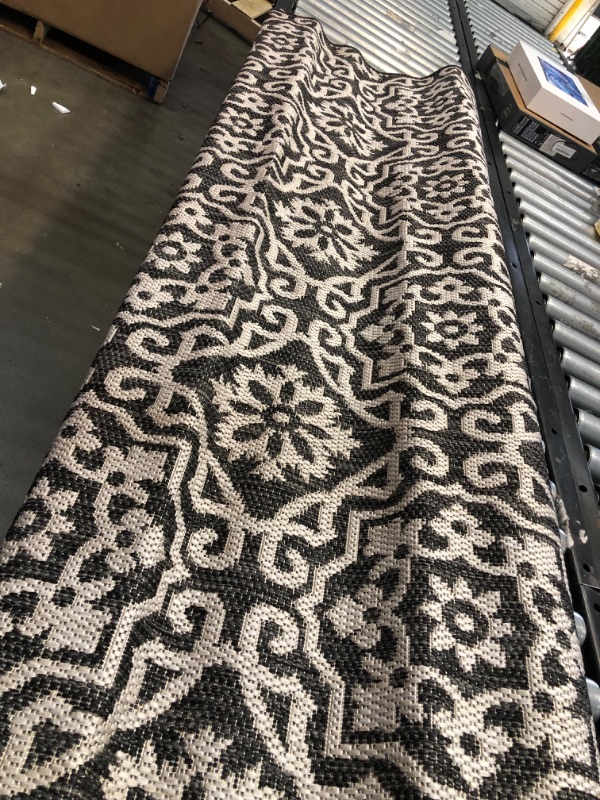 Photo 2 of **used, needs cleaning**
Nicole Miller New York Patio Country Danica Transitional Geometric Indoor/Outdoor Area Rug, Black/Grey, 5'2"x7'2" 5'2"x7'2" Rectangle Black/Grey