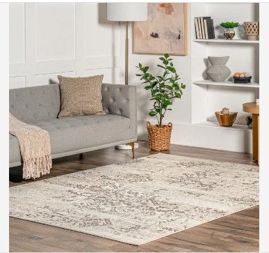 Photo 1 of **used, needs cleaning**
  Freja 11 x 15 Beige Indoor Floral/Botanical Area Rug
