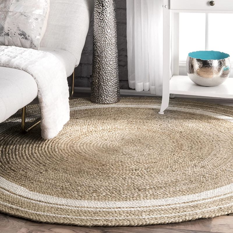 Photo 1 of **used, needs cleaning**
nuLOOM Rikki Braided Border Jute Area Rug, 6' Round, Off-white
