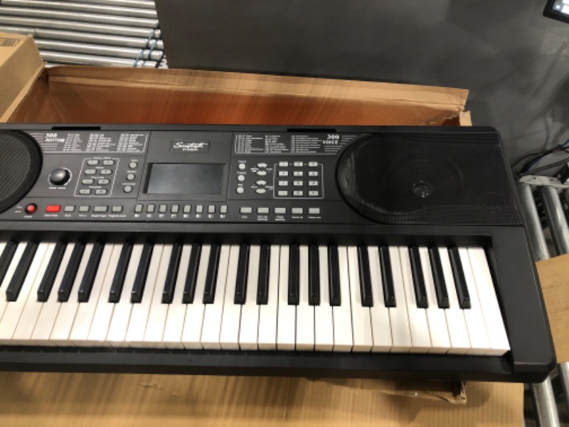 Photo 2 of Sawtooth 61 Key Portable Electronic Digital Keyboard Piano with Chromacast Stand, Headphones, Adapter, Built in Metronome & 50 Preset songs to play along with
