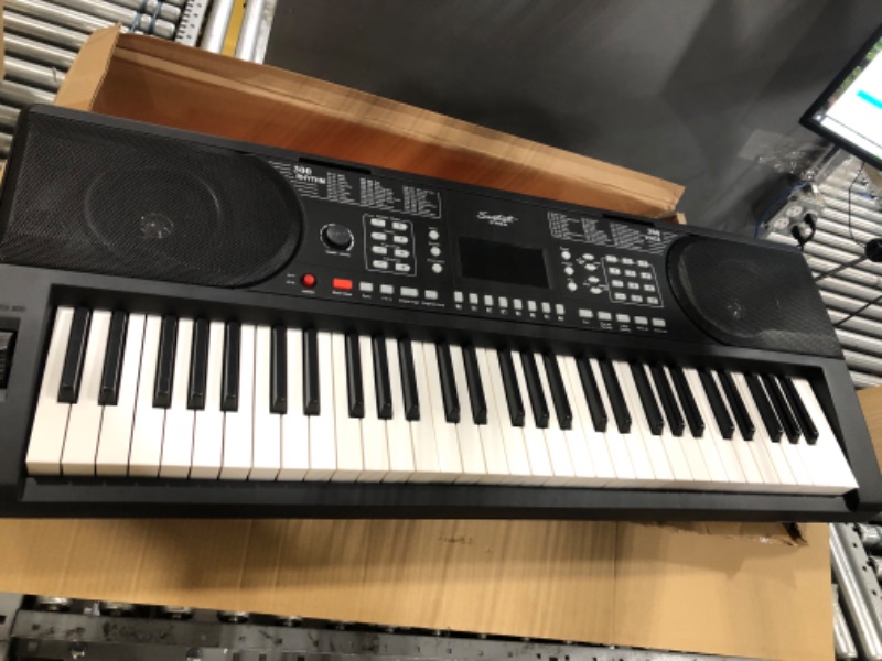 Photo 4 of Sawtooth 61 Key Portable Electronic Digital Keyboard Piano with Chromacast Stand, Headphones, Adapter, Built in Metronome & 50 Preset songs to play along with
