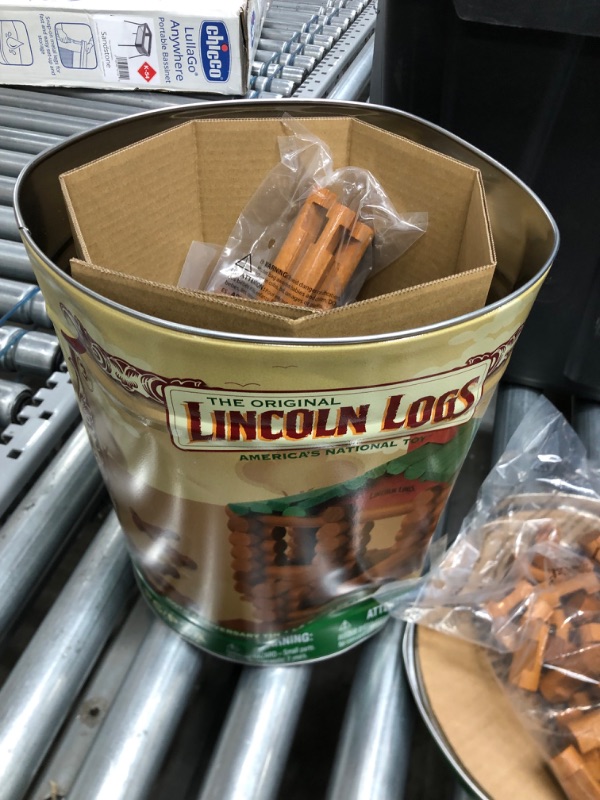 Photo 3 of DAMAGED ITEM
Lincoln Logs –100th Anniversary Tin-111 Pieces-Real Wood Logs-Ages 3+ - Best Retro Building Gift Set for Boys/Girls - Creative Construction Engineering – Top Blocks Game Kit - Preschool Education Toy, Brown (854)
