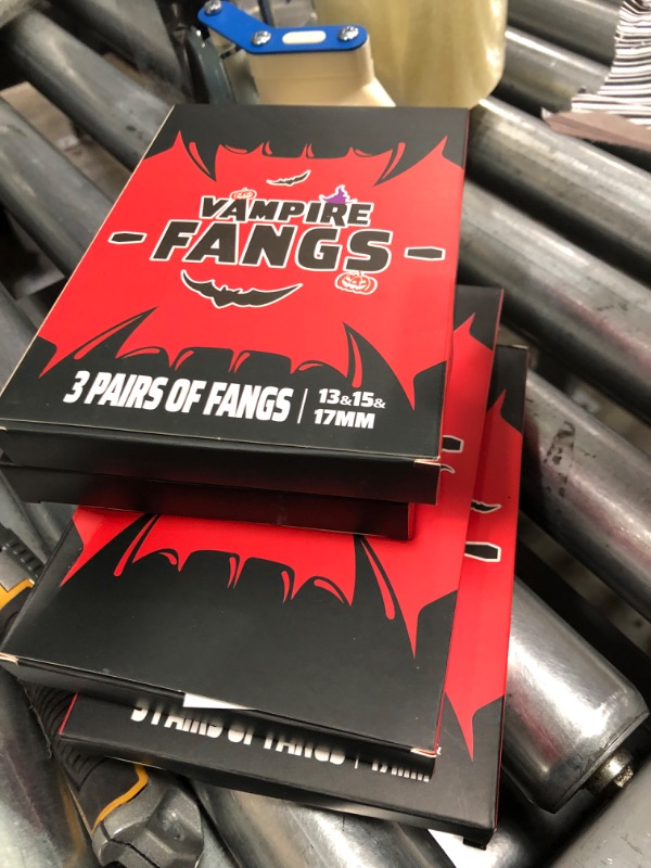 Photo 1 of 4   boxes     vampire fangs 3ct