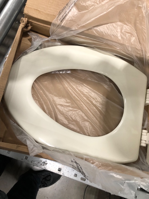 Photo 3 of **OPENED**
Bemis 1500EC Elongated Wood Toilet Seat Biscuit