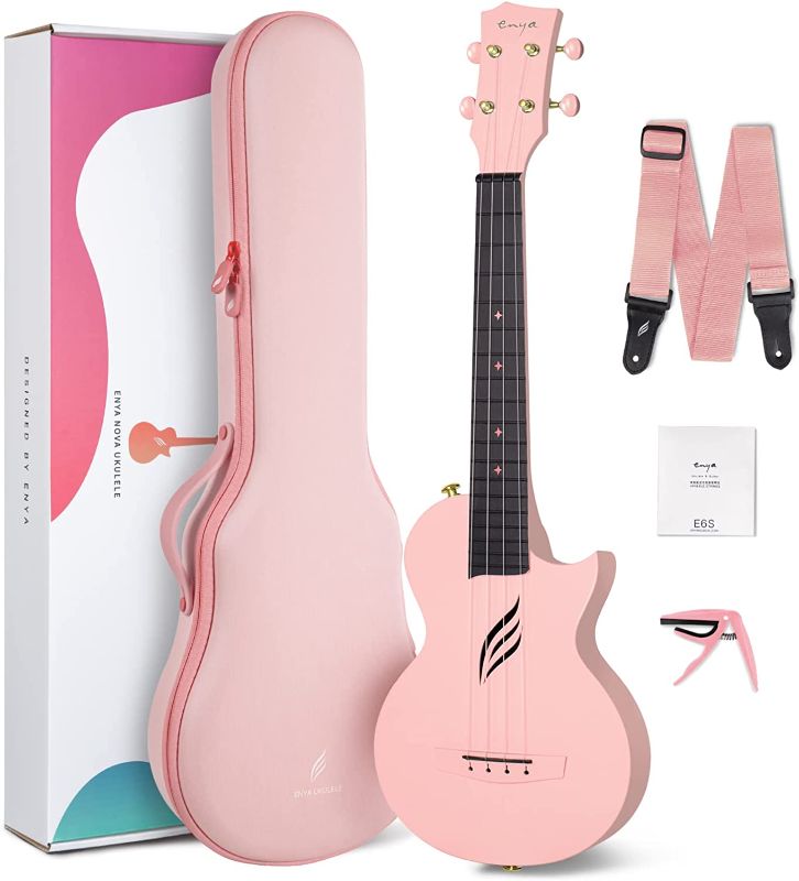 Photo 1 of 
Roll over image to zoom in
Enya Concert Ukulele Nova U 23’’ Carbon Fiber Travel Ukulele with Beginner Kit includes online lessons, case, strap, capo and strings (Pink)