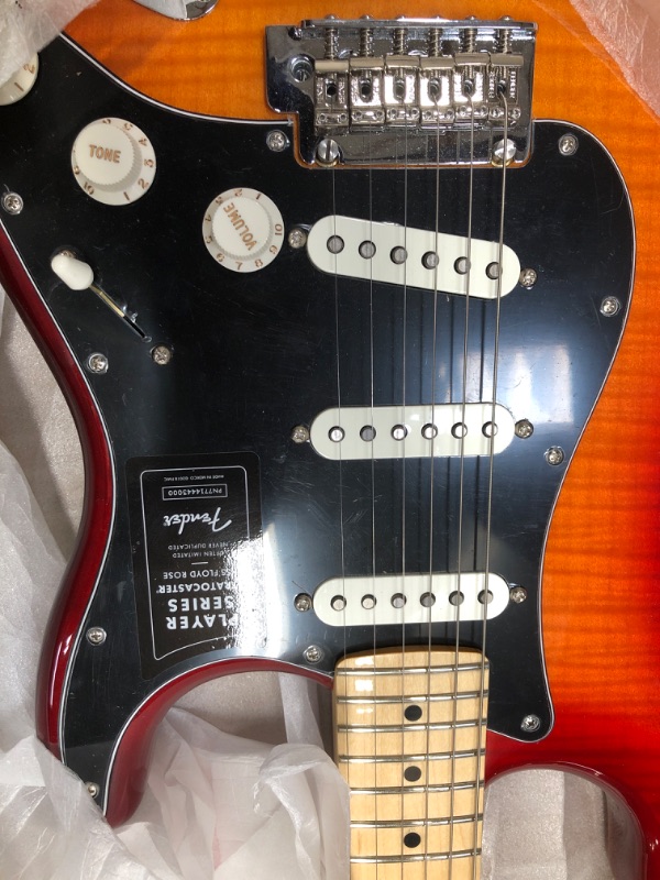 Photo 3 of Fender Player Stratocaster HSS Plus Top - Aged Cherry Sunburst Bundle with Hard Case, Cable, Tuner, Strap, Strings, Picks, Capo, Fender Play Online Lessons Lessons, and Austin Bazaar Instructional DVD
