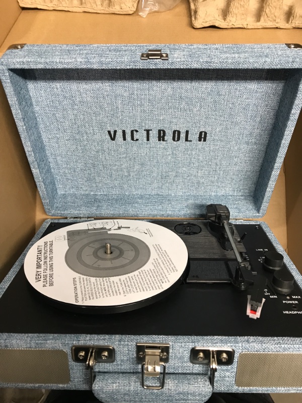 Photo 2 of Victrola Vintage 3-Speed Bluetooth Portable Suitcase Record Player with Built-in Speakers | Upgraded Turntable Audio Sound| Includes Extra Stylus | Light Denim Blue Linen
