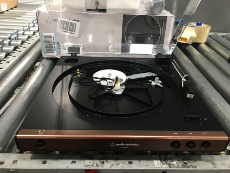 Photo 3 of **not functional,parts only**
Audio-Technica At-LP60X-BW Fully Automatic Belt-Drive Stereo Turntable, Hi-Fi, 2 Speed, Dust Cover, Anti-Resonance, Die-Cast Aluminum Platter Brown
