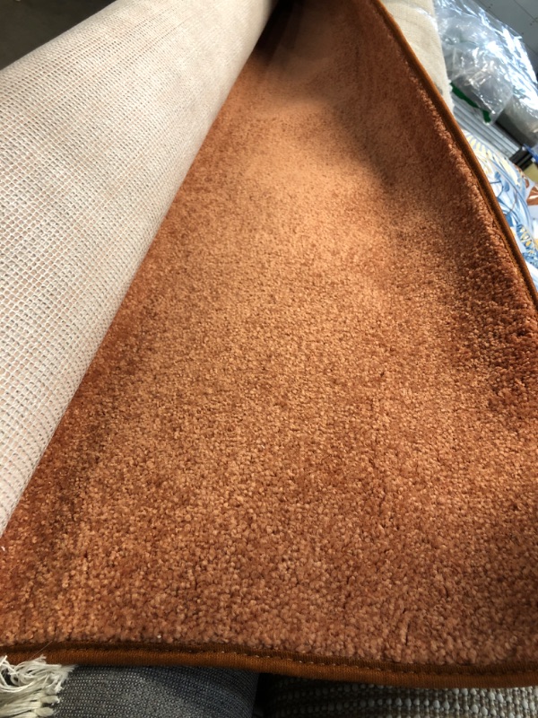 Photo 1 of 5X8 ORANGE RUG