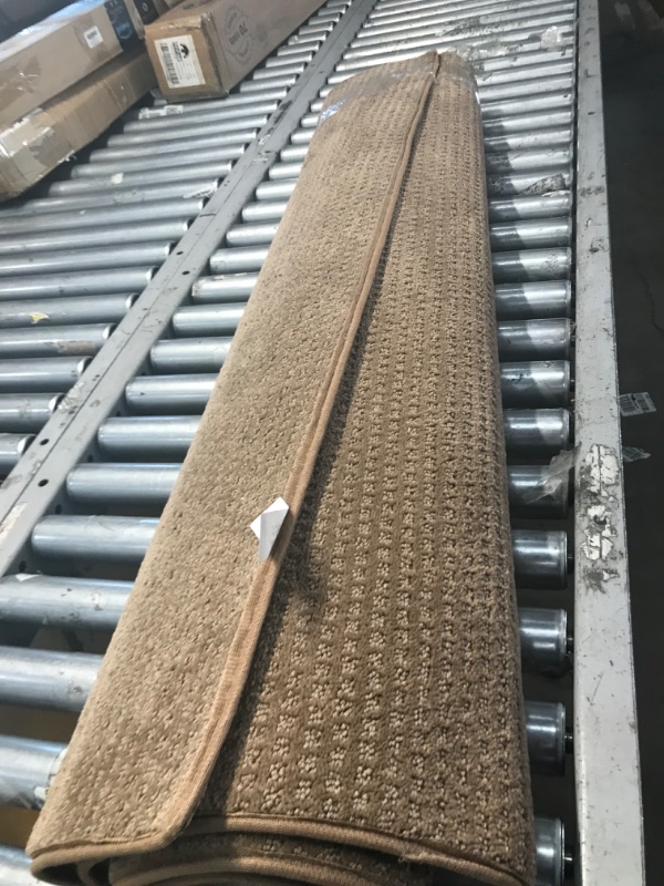 Photo 1 of 4ft by 6dt brown area rug