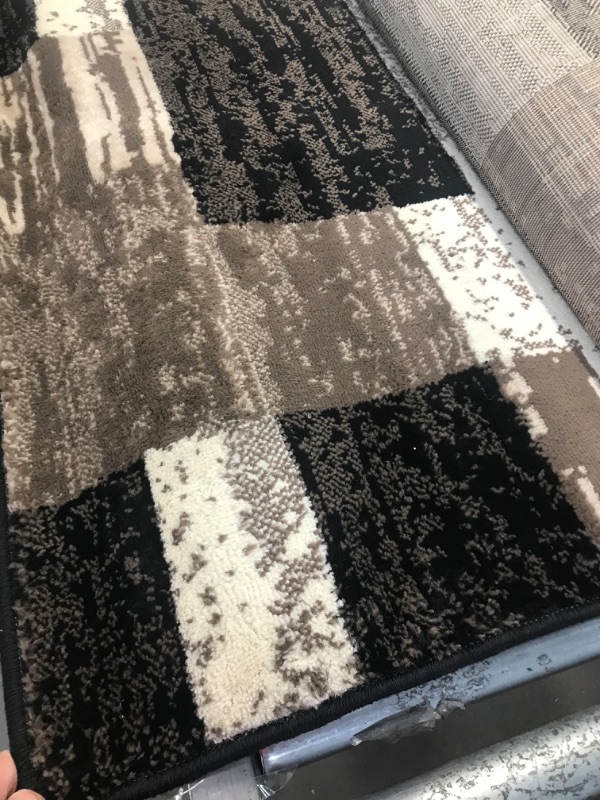 Photo 1 of 7ft X 10ft Black white and Brown Color Area Rug