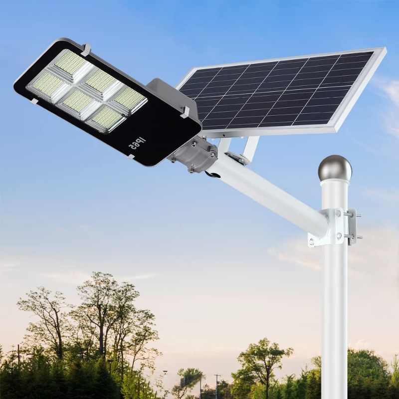 Photo 1 of 400W LED Solar Street Lights Outdoor, Dusk to Dawn Security Flood Light with Remote Control, Waterproof, Ideal for Parking Lot, Yard, Pathway and Driveway (Cool White)