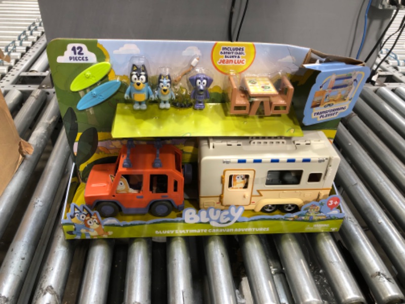 Photo 2 of Bluey Ultimate Caravan Adventures - Caravan Playset and Three 2.5-3" Figures & 4WD Family Vehicle with 2 Surfboards
