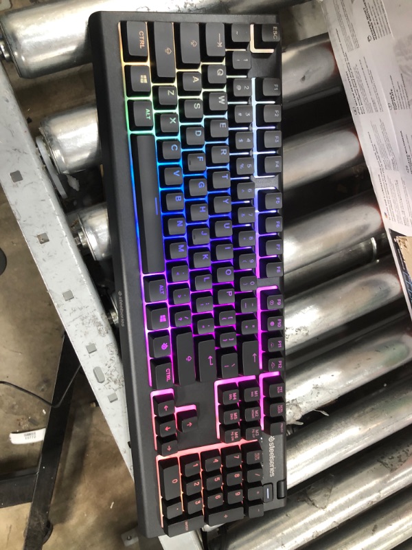 Photo 2 of SteelSeries Apex 3 RGB Gaming Keyboard – 10-Zone RGB Illumination – IP32 Water Resistant – Premium Magnetic Wrist Rest (Whisper Quiet Gaming Switch)