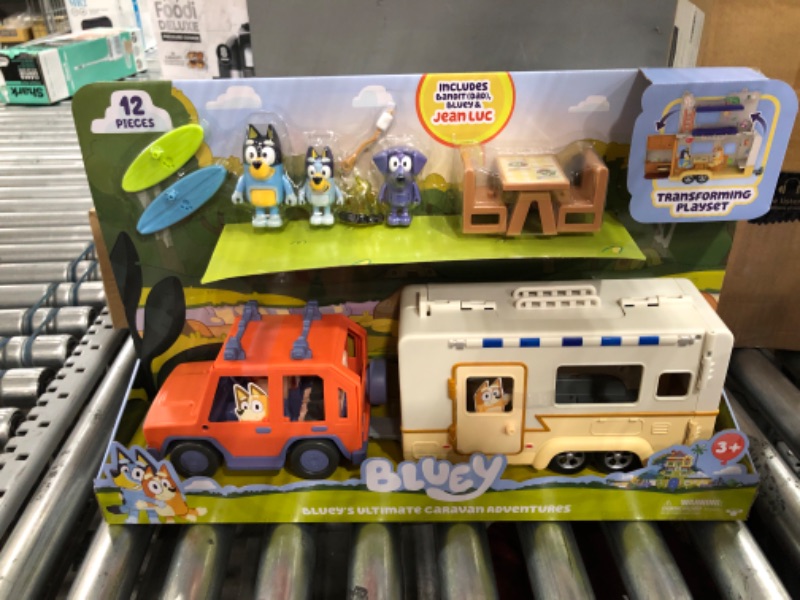 Photo 2 of Bluey Ultimate Caravan Adventures - Caravan Playset and Three 2.5-3" Figures & 4WD Family Vehicle with 2 Surfboards
