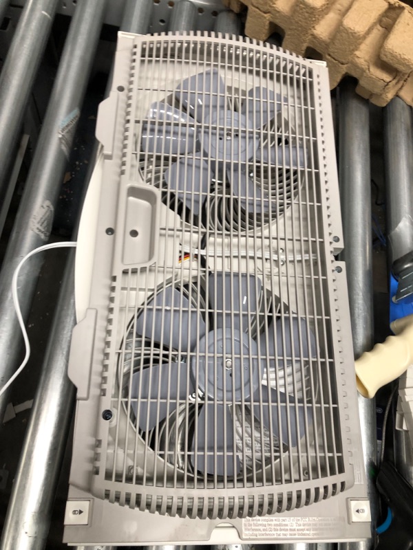 Photo 5 of **used**
Bionaire Window Fan with Twin 8.5-Inch Reversible Airflow Blades and Remote Control, White White 2 Blades Electronic control with LCD screen Window Fan