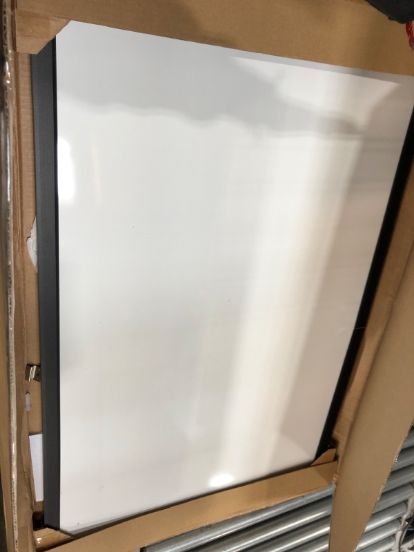 Photo 2 of Amazon Basics Magnetic Dry Erase White Board, 35 x 23-Inch Whiteboard - Black Wooden Frame 23"x35" Magnetic, Wood Frame