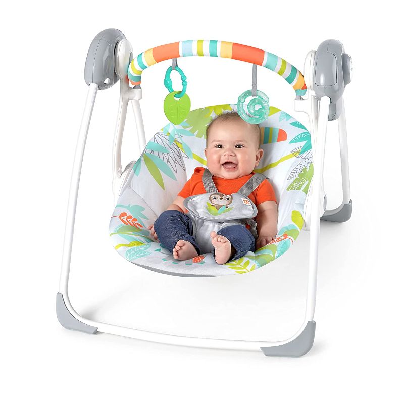 Photo 1 of Bright Starts Rainforest Vibes Portable Compact Baby Swing with TrueSpeed, Toy Bar included, Newborn and up
