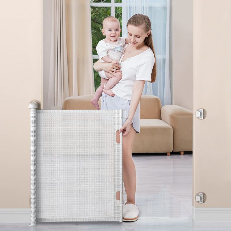 Photo 1 of  Retractable Baby Gates, Punch-Free Install Baby Gate Extra Wide 55” X 33” Tall for Kids or Pets Indoor and Outdoor Dog Gates for Doorways, Stairs, Hallways, White

