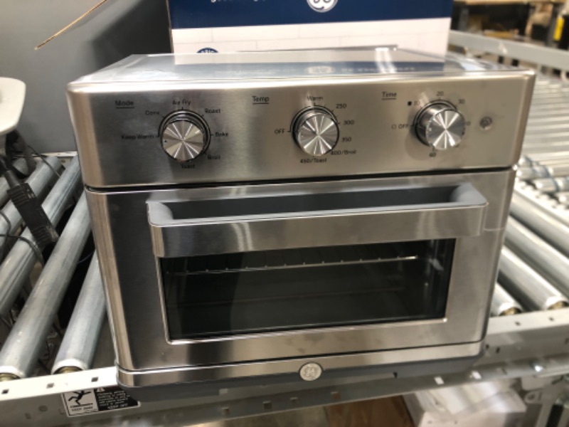 Photo 2 of **nonfunctional**
GE Mechanical Air Fryer Toaster Oven + Accessory Set | Convection Toaster with 7 Cook Modes | Large Capacity Oven - Fits 12" Pizza | Countertop Kitchen Essentials | Stainless Steel Mechanical Controls