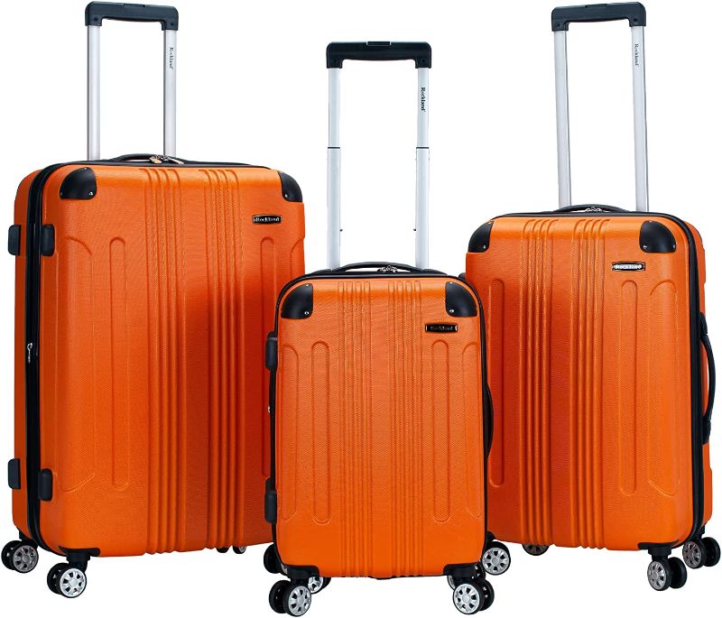 Photo 1 of Rockland London Hardside Spinner Wheel Luggage, Orange, 3-Piece Set (20/24/28)
