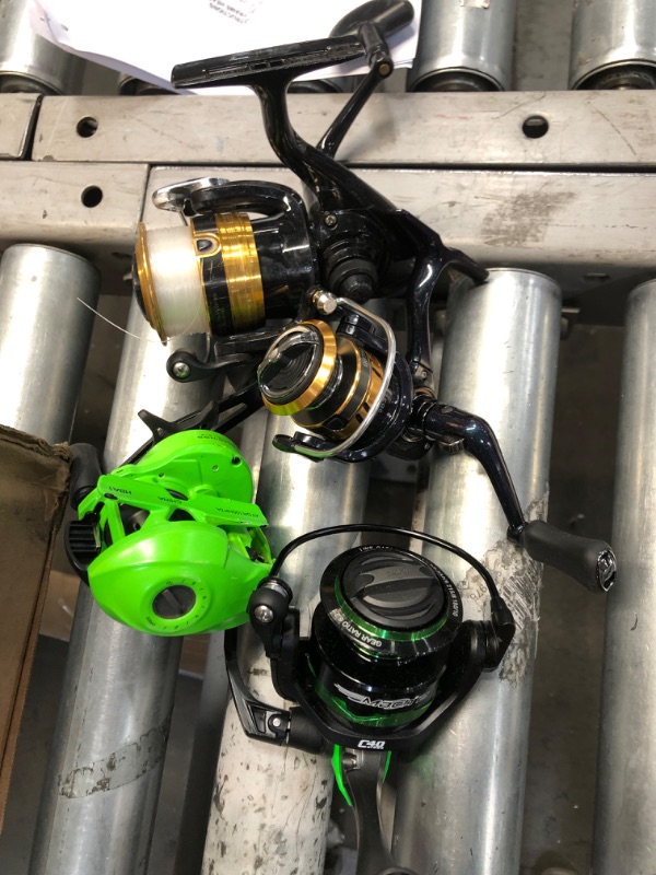 Photo 1 of **BUNDLE OF 4 FISHING REELS