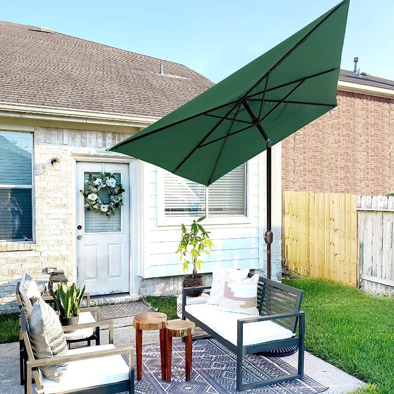Photo 1 of **PARTS ONLY** 6.5 x 10 ft Rectangular Patio Market Table Umbrella (STOCK PHOTO is ONLY a reference photo)  

